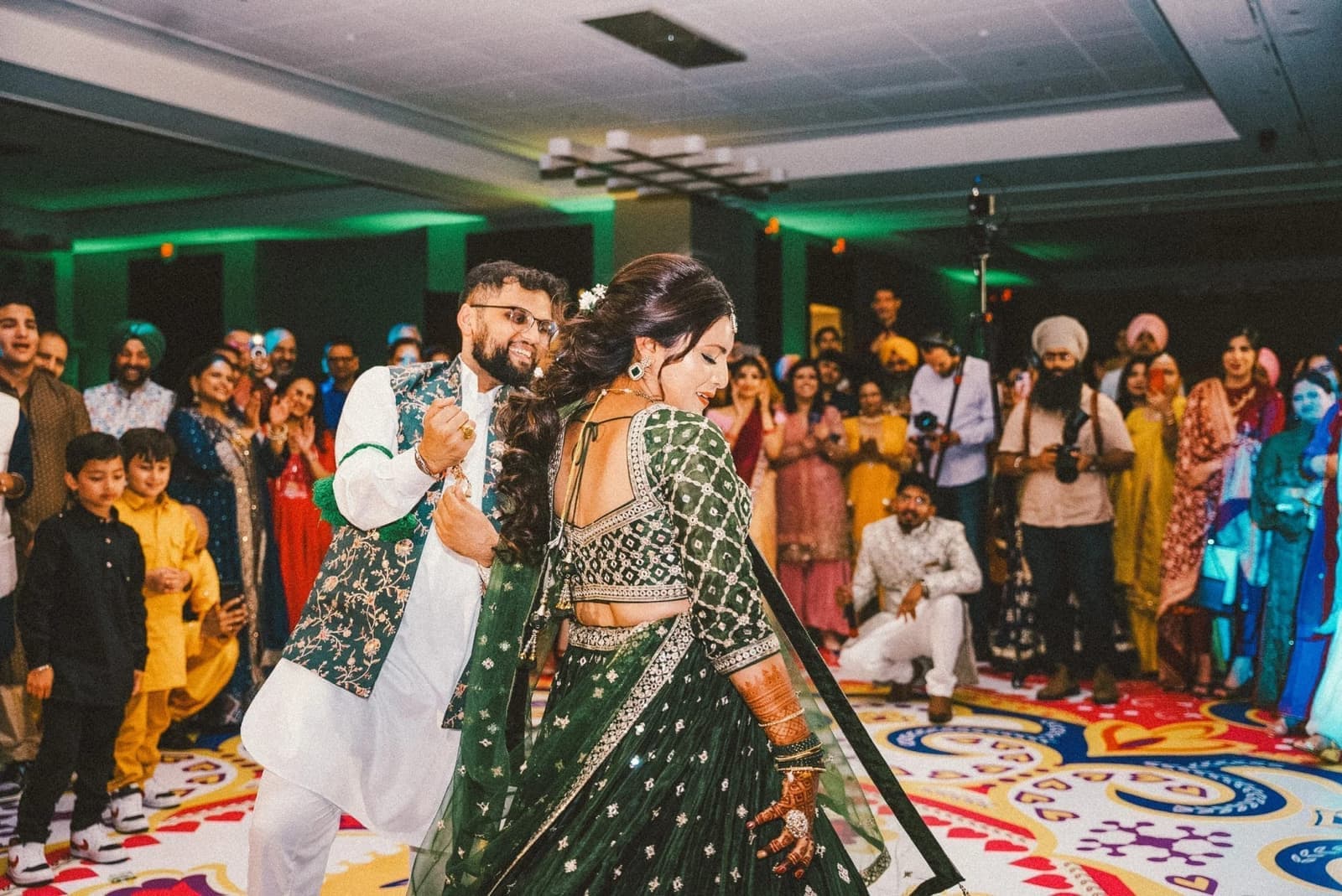 Couple sharing a warmly lit first dance